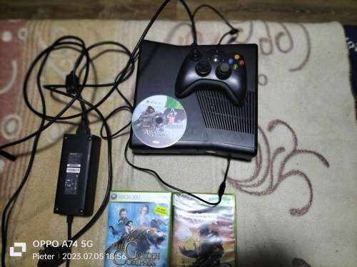 Xbox 360 console with games