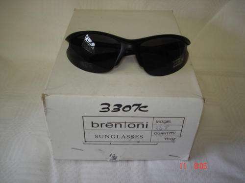 box of sunglasses black 1 dozen  / uv 100 protection.@ R30.per box.