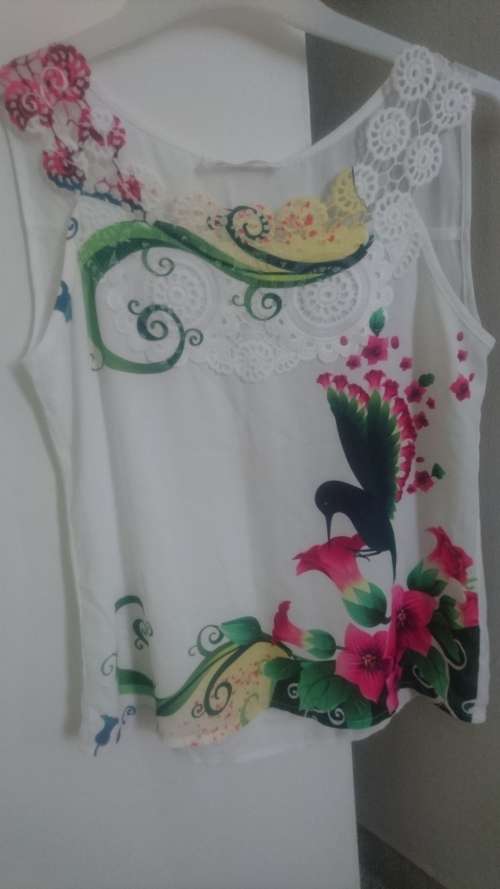 Elegant lace top with bird print