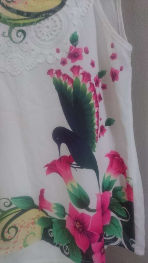 Elegant lace top with bird print