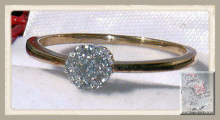 A GORGEOUS 9CT YELLOW GOLD .25 CARAT DIAMOND LADIES RING SIZE V