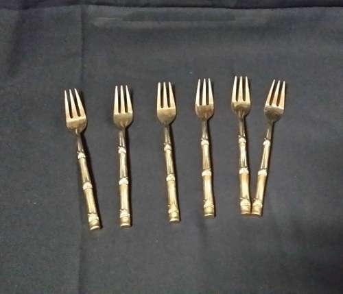 FIVE  BRASS CAKE FORKS