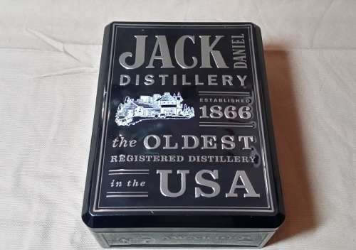 JACK DANIEL DISTILLERY  BOTTLE AND GLASS SET IN TIN BOX