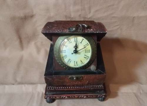 CLOCK CASED IN WOODEN BOX
