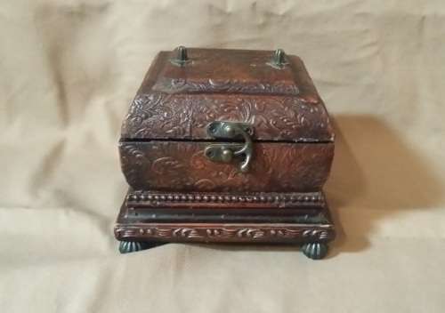 CLOCK CASED IN WOODEN BOX