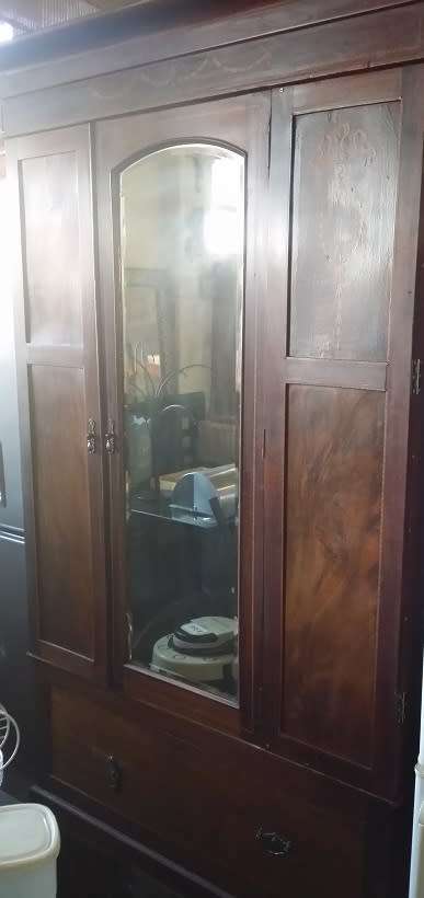 ANTIQUE WARDROBE  WITH  LARGE DRAWER AND BEVELLED MIRROR   / BUYER MUST COLLECT IN EDENVALE JHB