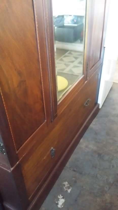 ANTIQUE WARDROBE  WITH  LARGE DRAWER AND BEVELLED MIRROR   / BUYER MUST COLLECT IN EDENVALE JHB