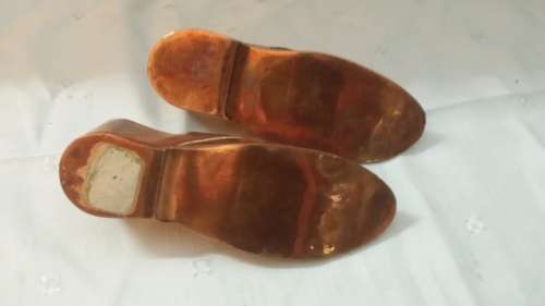 TWO COPPER SHOES