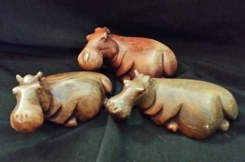 SET OF THREE STONE  HIPPO ORNAMENTS