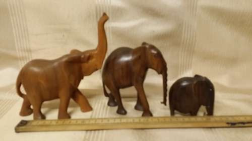 SET OF THREE WOODEN ELEPHANT ORNAMENTS