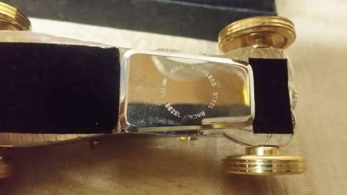 ORNAMENTAL METAL CAR WITH CLOCK