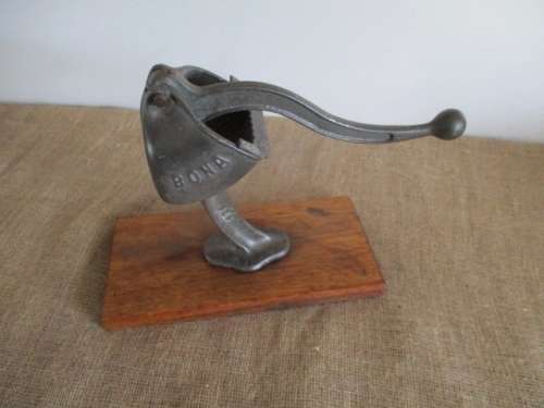 Antique/Vintage Cast Iron Bona Beer 131 Lemon Squeezer On Wooden Board       Germany