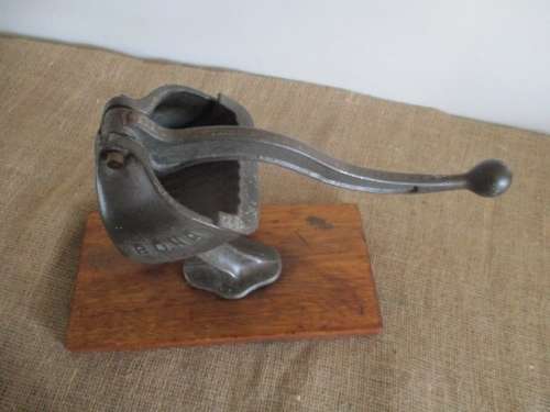 Antique/Vintage Cast Iron Bona Beer 131 Lemon Squeezer On Wooden Board       Germany