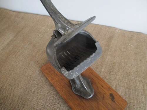 Antique/Vintage Cast Iron Bona Beer 131 Lemon Squeezer On Wooden Board       Germany