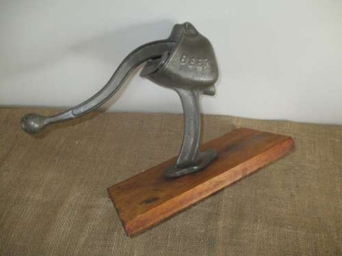 Antique/Vintage Cast Iron Bona Beer 131 Lemon Squeezer On Wooden Board       Germany