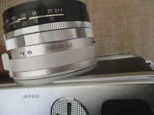 Vintage Minolta Hi-Matic 7s Camera With Minolta Rokkor - PF 1: 1.8 f = 45mm Lens In Pouch