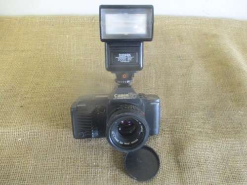 Vintage Canon T70 Camera With Attached Canon Lens FD 50mm 1 : 1.8 & Sunpak 2000BZ Thyristor