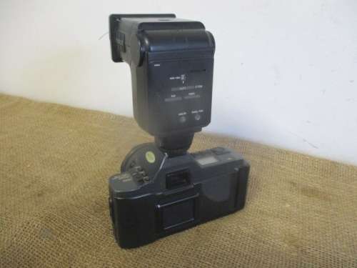 Vintage Canon T70 Camera With Attached Canon Lens FD 50mm 1 : 1.8 & Sunpak 2000BZ Thyristor