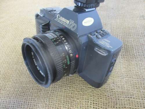 Vintage Canon T70 Camera With Attached Canon Lens FD 50mm 1 : 1.8 & Sunpak 2000BZ Thyristor