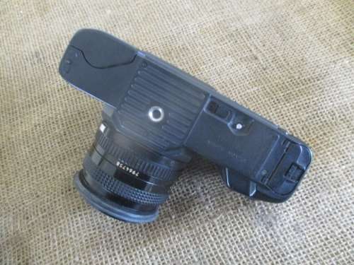 Vintage Canon T70 Camera With Attached Canon Lens FD 50mm 1 : 1.8 & Sunpak 2000BZ Thyristor