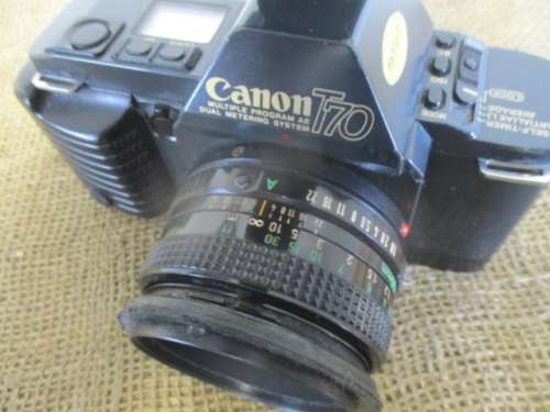 Vintage Canon T70 Camera With Attached Canon Lens FD 50mm 1 : 1.8 & Sunpak 2000BZ Thyristor