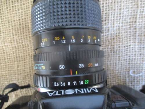 Popular Vintage Minolta X-300s SLR Camera With Film And Attached Minolta MD Zoom 28 - 70 mm Lens