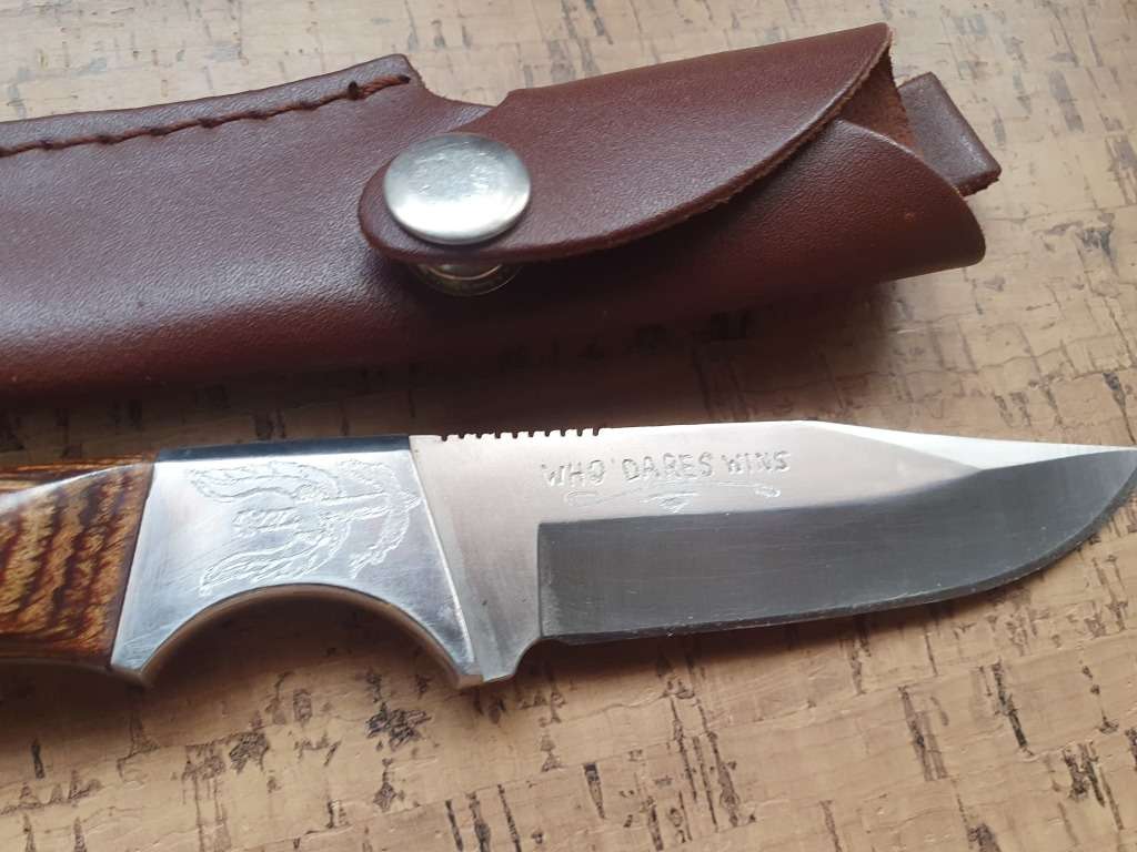 Unknown fixed blade with leather sheath
