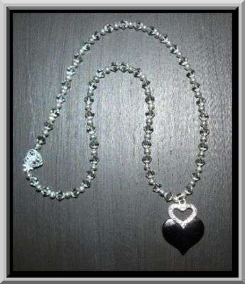Black Diamond Swarovski Necklace adorned with a Heart Pendant