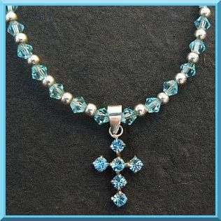 Sterling Silver and Crystal Necklace adorned with Swarovski Cross