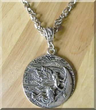 Necklace adorned with a Fairy on the Moon Pendant