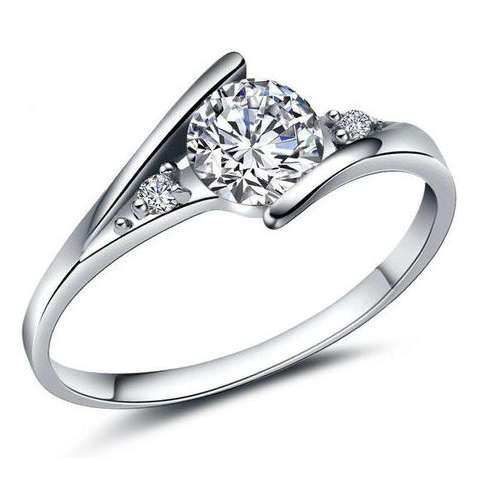 White zircon halo rhodium plated ring. Size 5, 6, 7, 8 (K, M, O, Q)