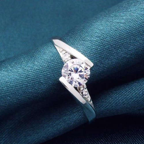 White zircon halo rhodium plated ring. Size 5, 6, 7, 8 (K, M, O, Q)