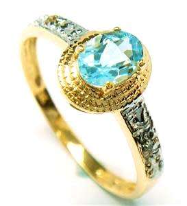 9CT YELLOW GOLD OVAL 0.55ct NATURAL BLUE TOPAZ & DIAMOND RING SIZE N / 6.5 - CERTIFIED