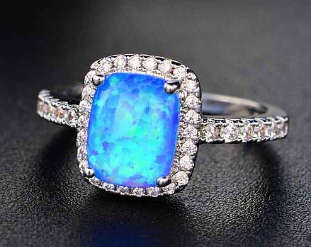 Sparkling Engagement Ring Simulated Fire Opal Blue. Size 5-11 available.