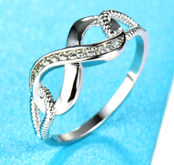 COURIER DELIVERY. Sparkling White CZ Infinity Symbol Ring. Size 5-10 available.