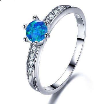 COURIER DELIVERY. Simulated Opal Solitaire with Accents Ring. Size 6-9 available.