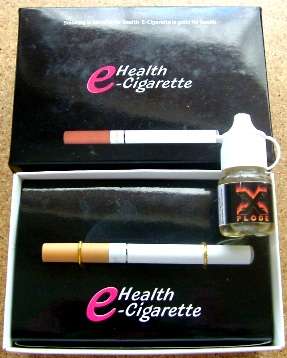 Unwanted Gift: THE E-CIGARETTE with catridges and liquid !! As new in box