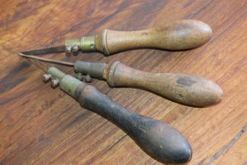 Beautiful Set of Antique Hand Saws