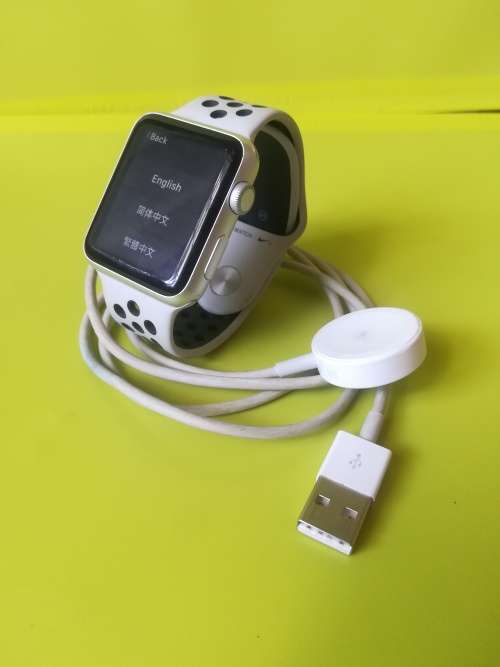 Advanced Series 1 Apple Watch (with white/grey nike strap and charger)