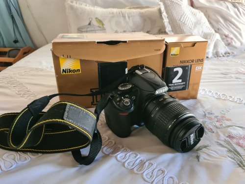 Nikon D3100 with Nikon 18-55mm lens