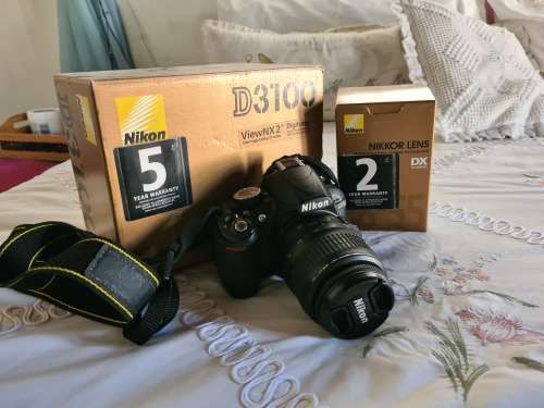 Nikon D3100 with Nikon 18-55mm lens