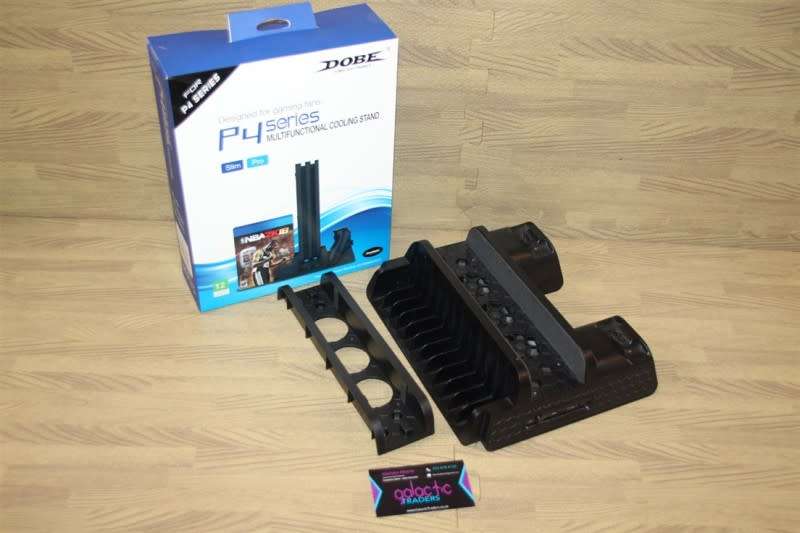 Pre owned ps4 SLIM with 2 games and cooling fan with charging port