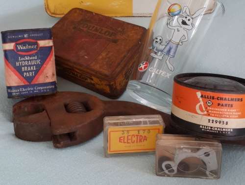 Lot of assorted classic automotive parts: Dunlop, Allis-Chalmers, Lockheed, Electra, Caltex, wrench