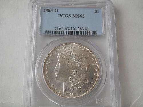 MORGAN DOLLAR 1885-0 (NEW ORLEANS MINT) MS63 BY PCGS.