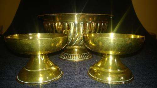 Set of three brass items