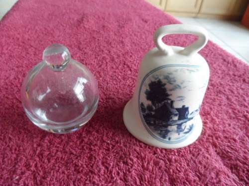 Heavy glass bottle and large bell