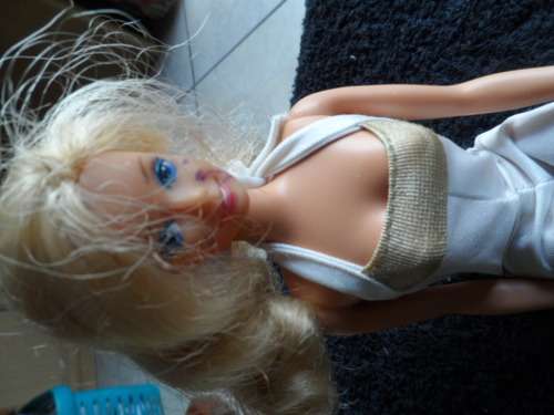 Barbie 1988 has pen marking on face