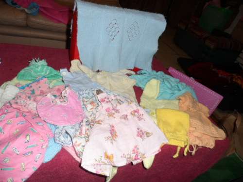 Lots of vintage first love dolls outfits