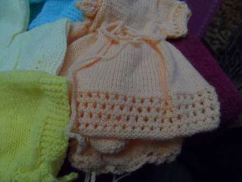 Lots of vintage first love dolls outfits