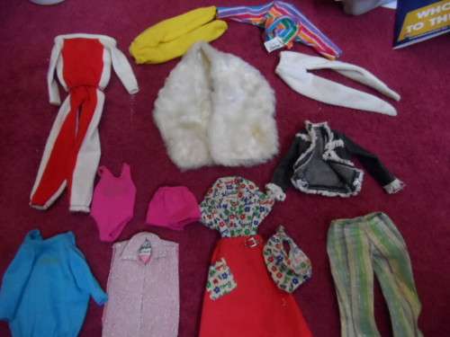 Lovely lot of genuine Barbie clothing.